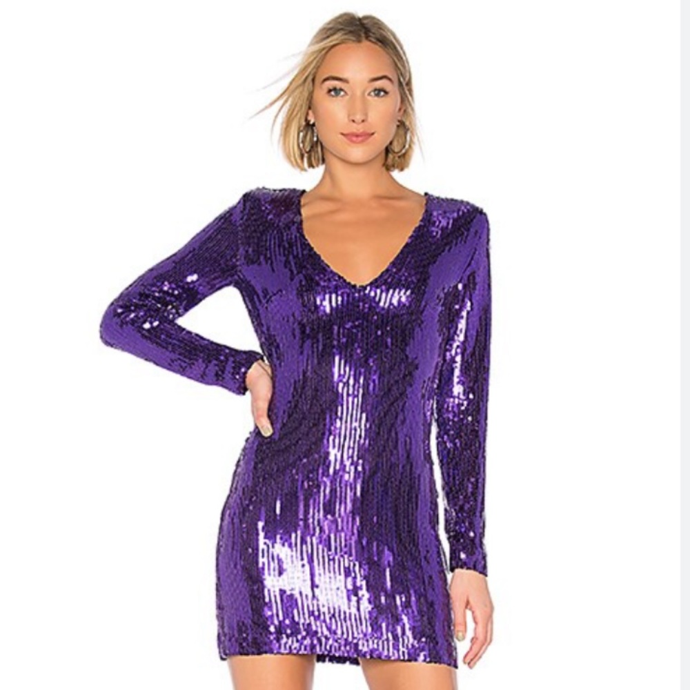 mini purple long-sleeve sequin dress with tags still attached. Size XS